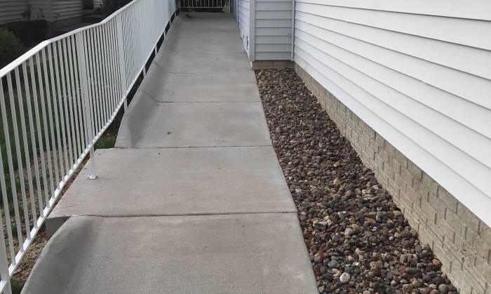 Concrete Ramp with Railing for Website Concrete Ramp with Railing Installed by BILD in Milwaukee