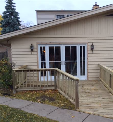 French Doors and Wood Ramp Wooden Wheelchair Ramp and Deck with French Doors Installed by BILD in Brookfield