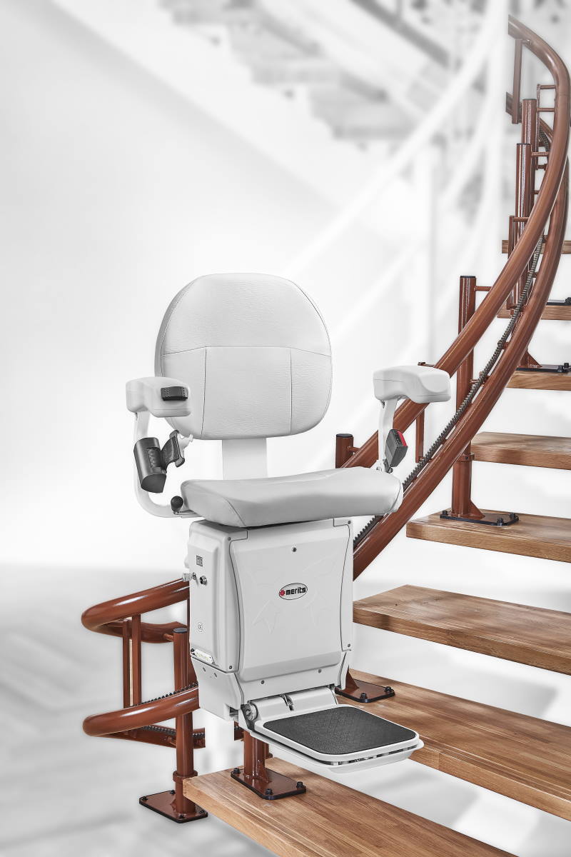 The Affordable Merits E604 Curved Stair Lift sold by BILD, Milwaukee.