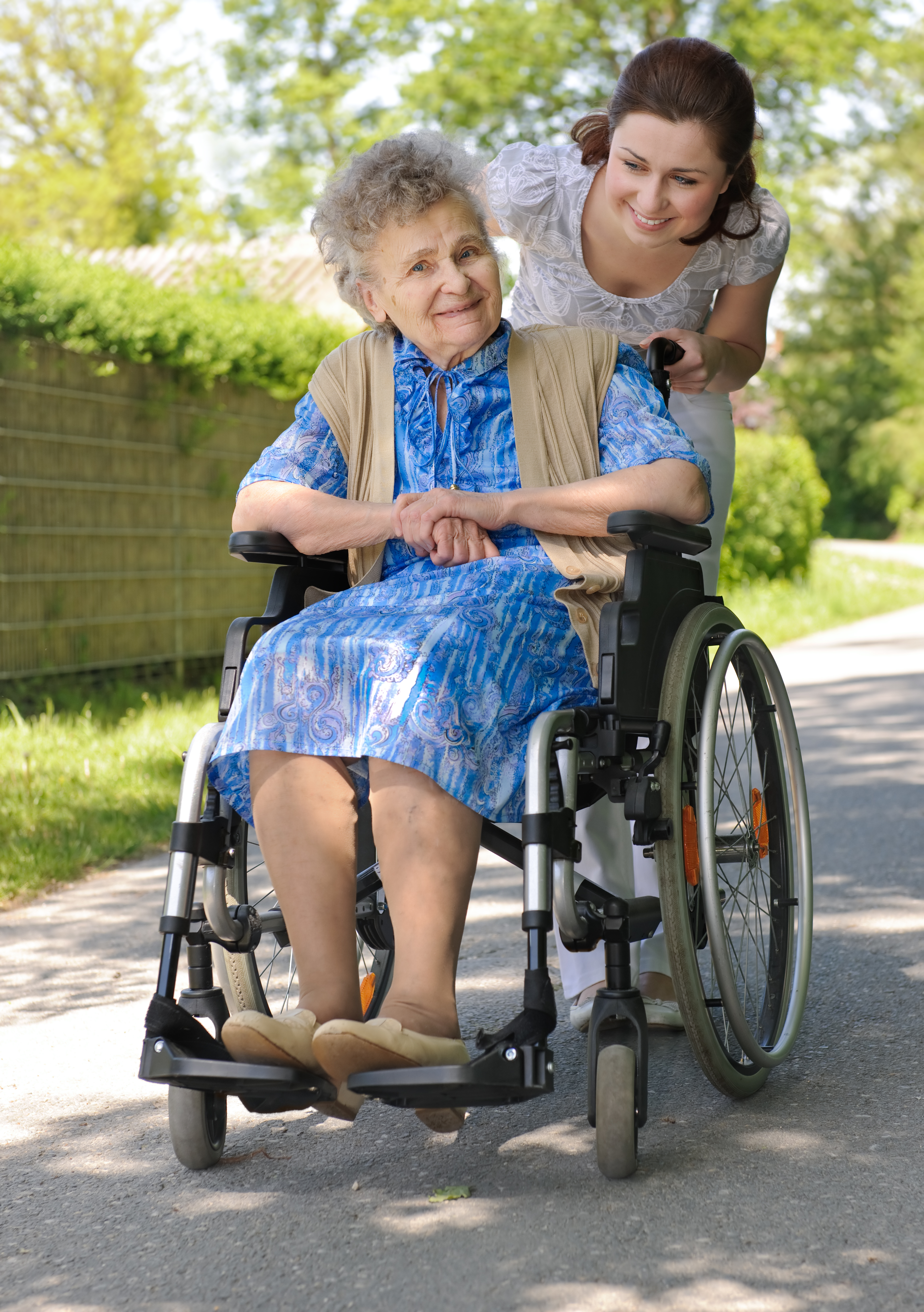 bigstockphoto_Senior_Woman_In_A_Wheelchair_5101334