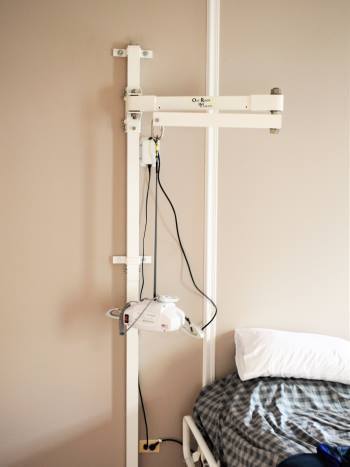 wall mounted reach arm mobility lift system