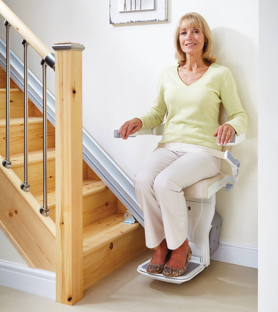 Woman on affordable stairlift in Milwaukee WI